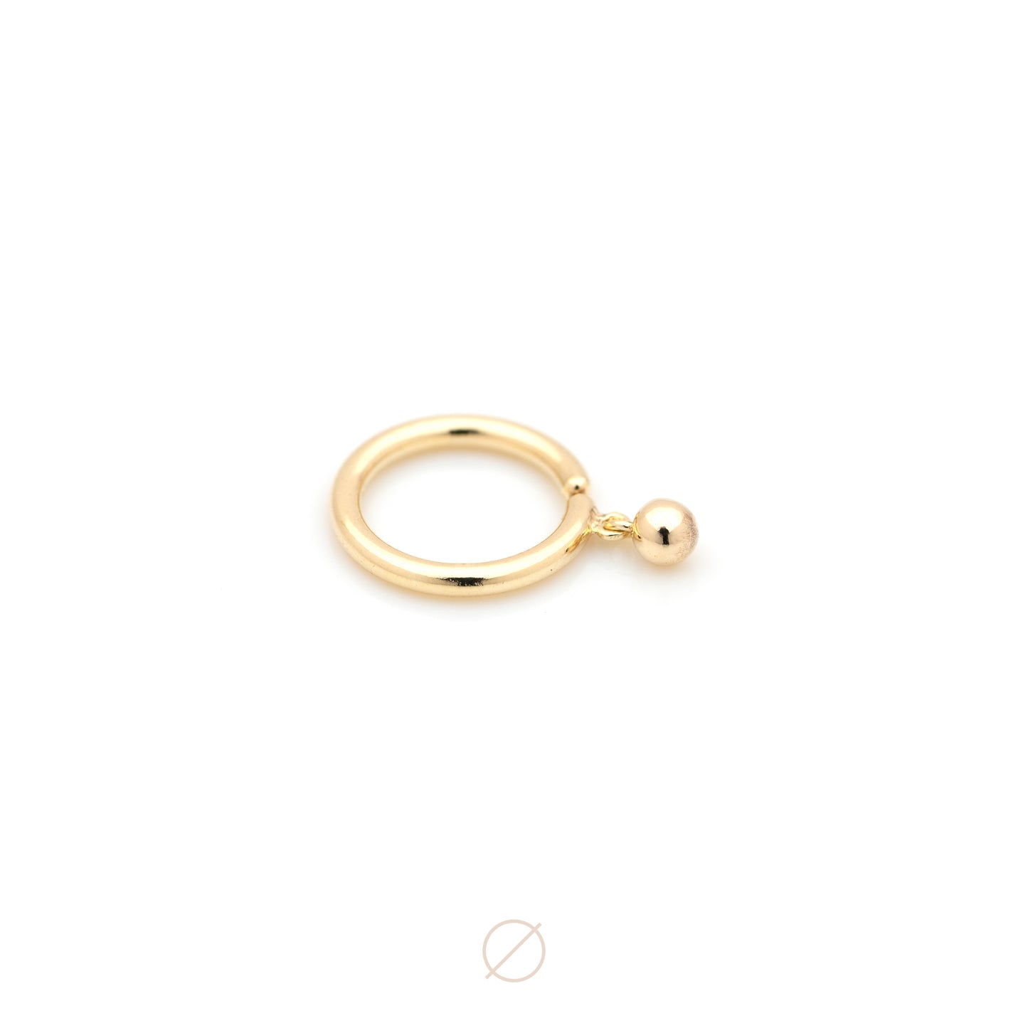 Droplet Huggie in Yellow Gold by Jack + G